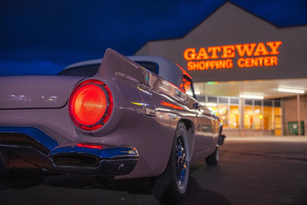 Gateway Shopping Center illuminated in the evening