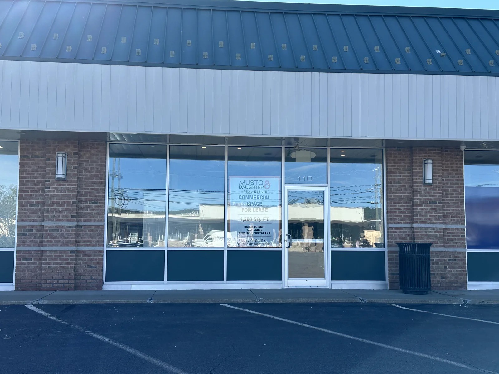 110 Gateway Shopping Center storefront with leasing sign